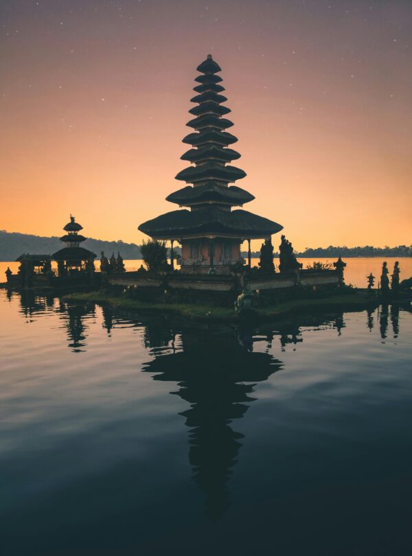 brown-pagoda-near-body-of-water - Bali Tour Packages